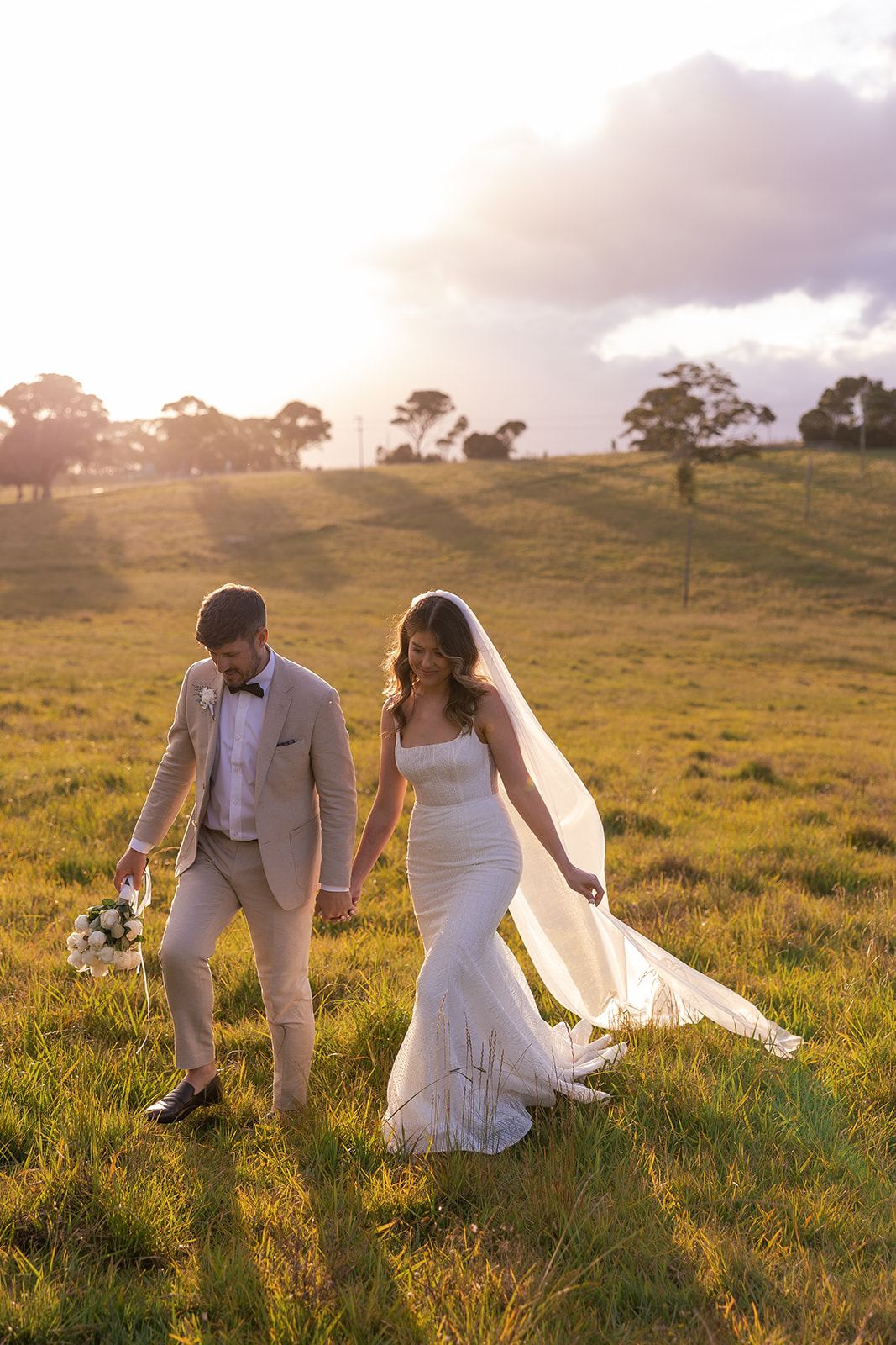 Couple in the paddock at Rosewood Estate