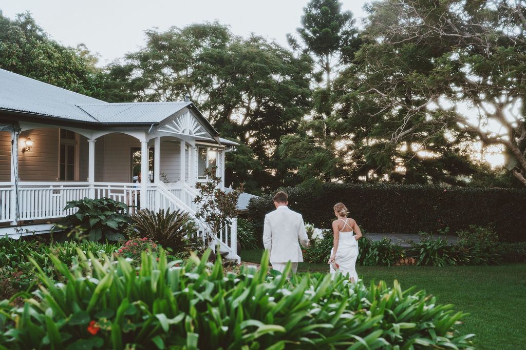 Bride and groom entering Rosewood Homestead