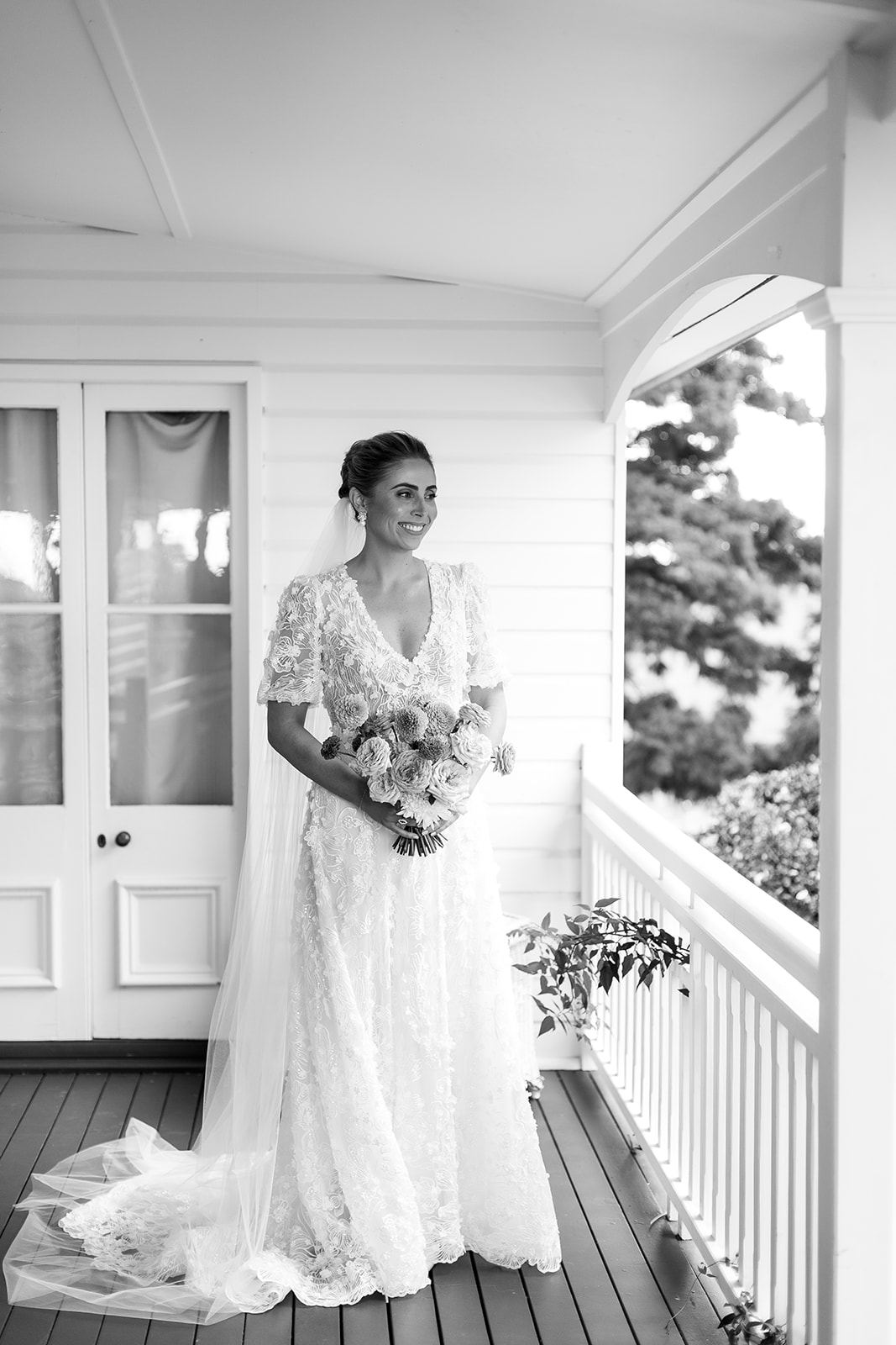 Bride on the verandah of Rosewood Homestead