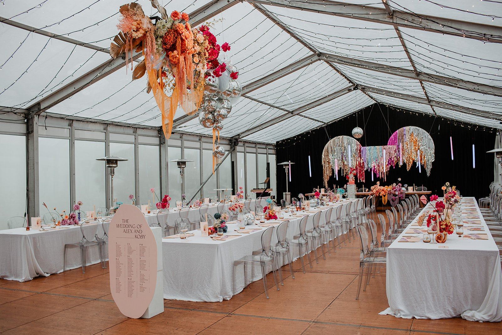 A colourful reception under the marquee's white roof